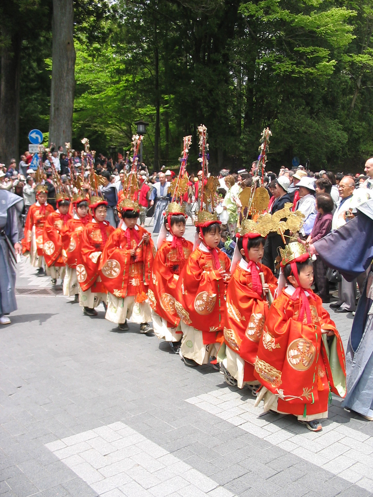 children in traditional orange robes